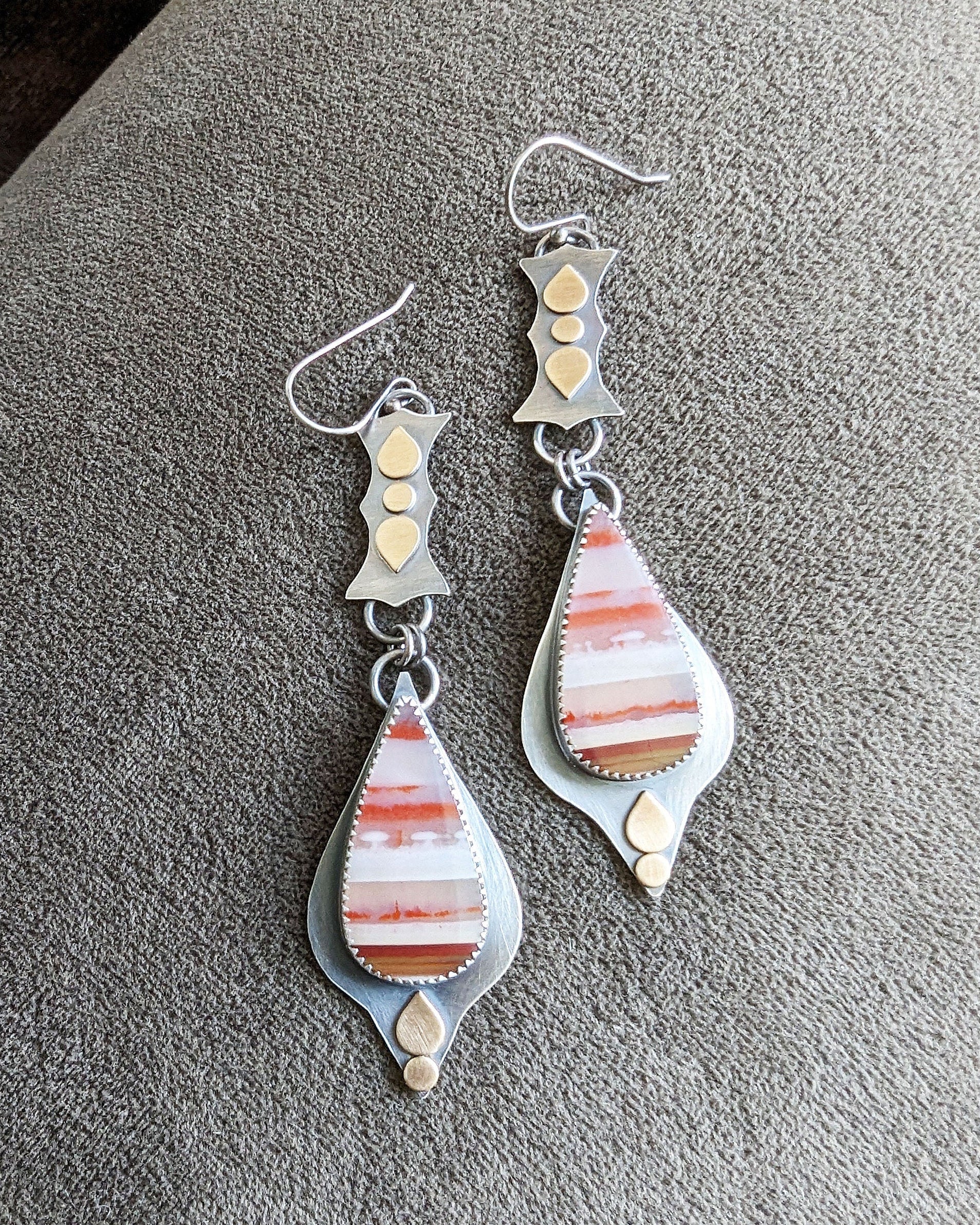 Linear sterling silver drop earrings with hand-cut brass accents