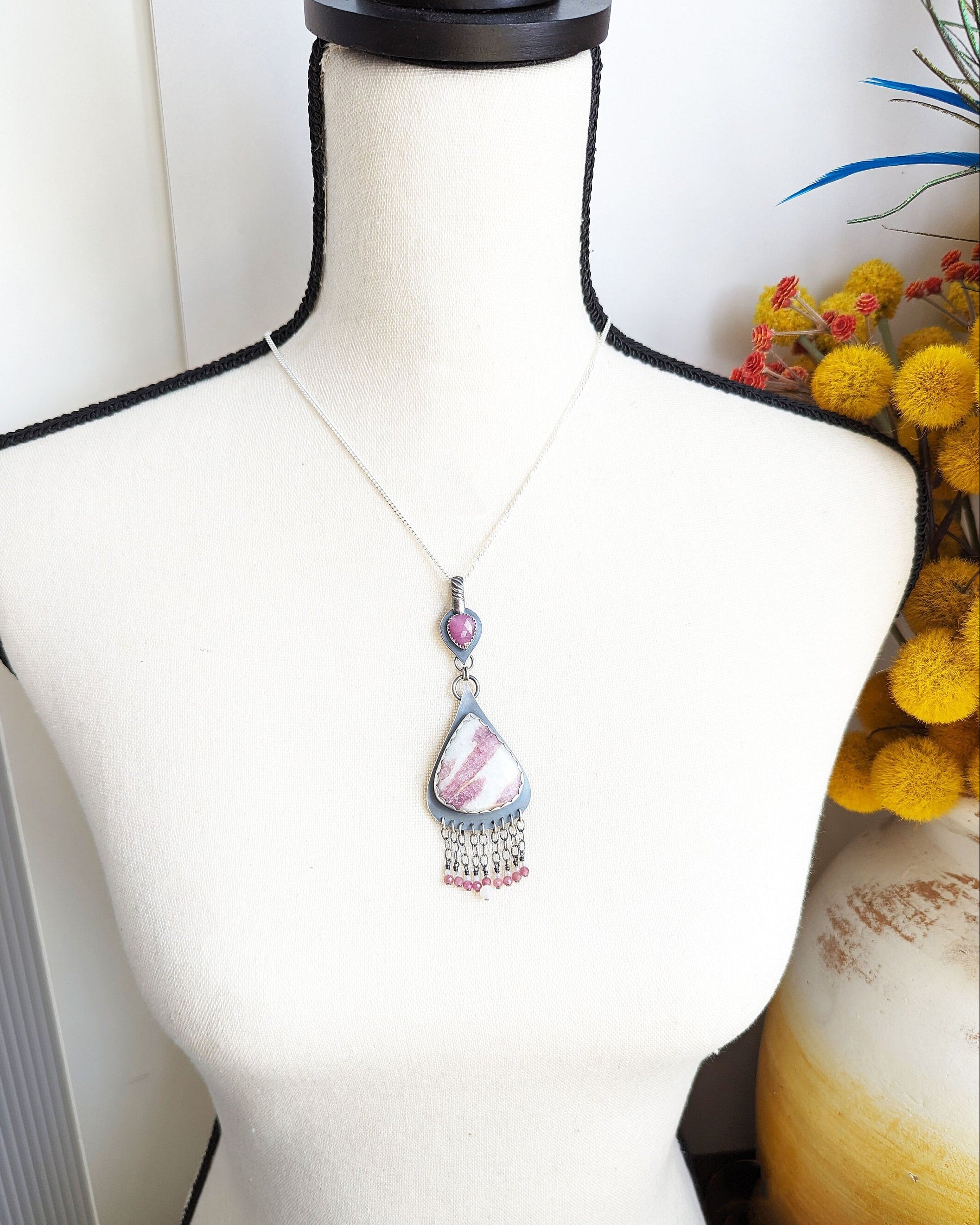 Collector-level two-stone sapphire and tourmaline quartz statement necklace on bust for scale