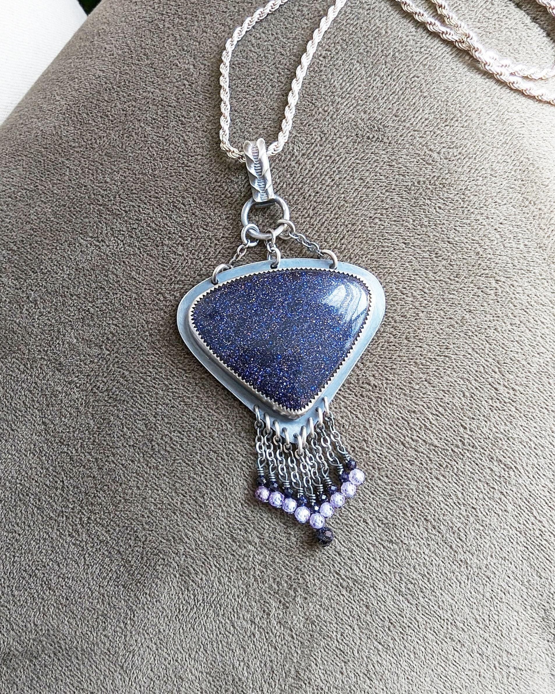 Blue goldstone chandelier pendant with cubic zirconia fringe in sterling silver shown on chain (not included)