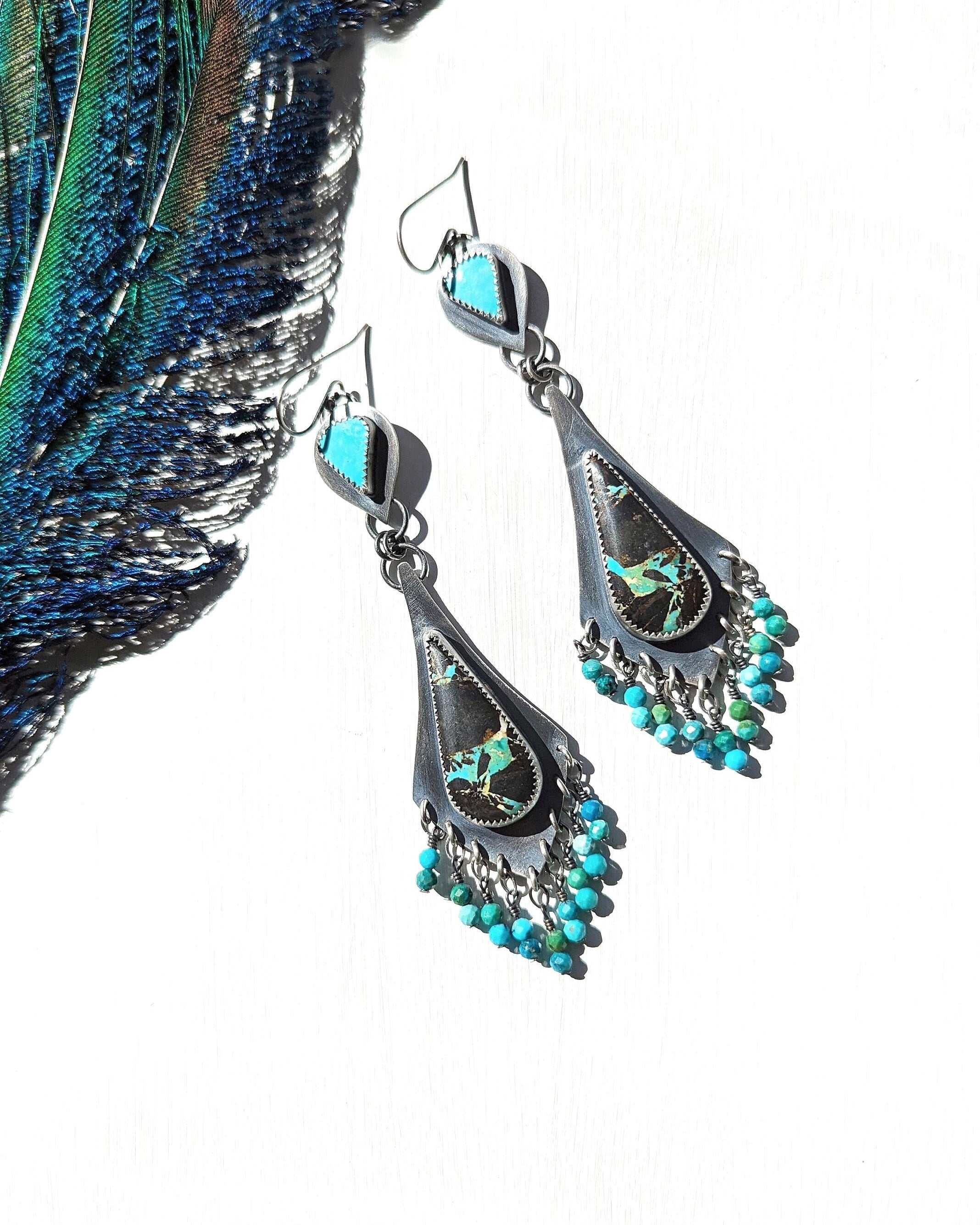 Nevada Black Jack turquoise earrings with bold blue matrix detail