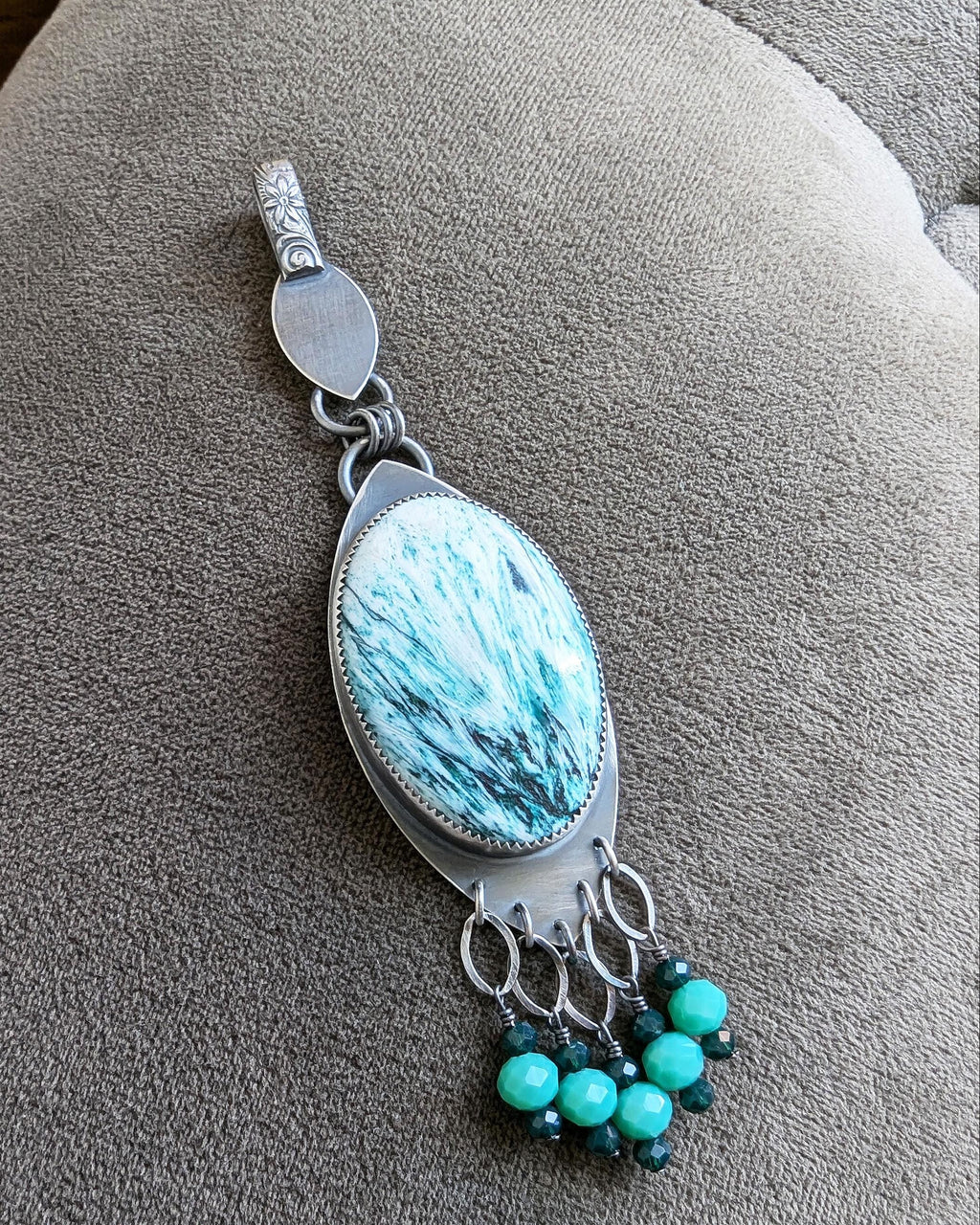 Boho statement necklace with green and blue scolecite crystal stone in natural light