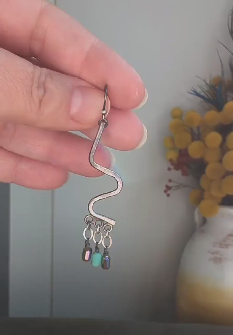 Video of handmade sterling silver earrings by Rebellenhaus
