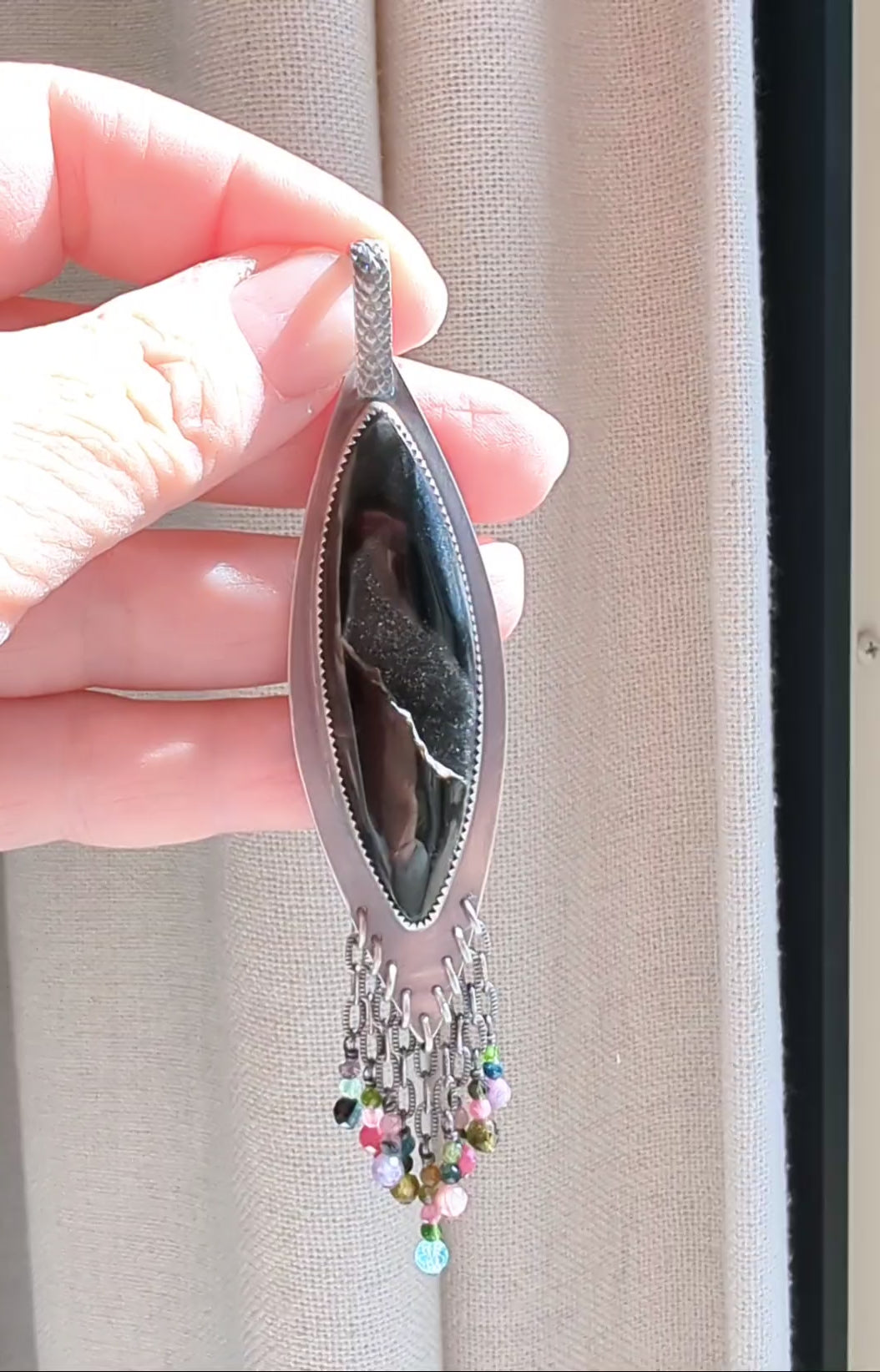 Video of The Universe Speaks pendant by Rebellenhaus