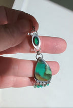 Video of unique gemstone earrings with green onyx and opal wood by Rebellenhaus
