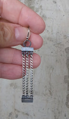 Video of minimalist statement earrings handcrafted in oxidized sterling silver by Rebellenhaus