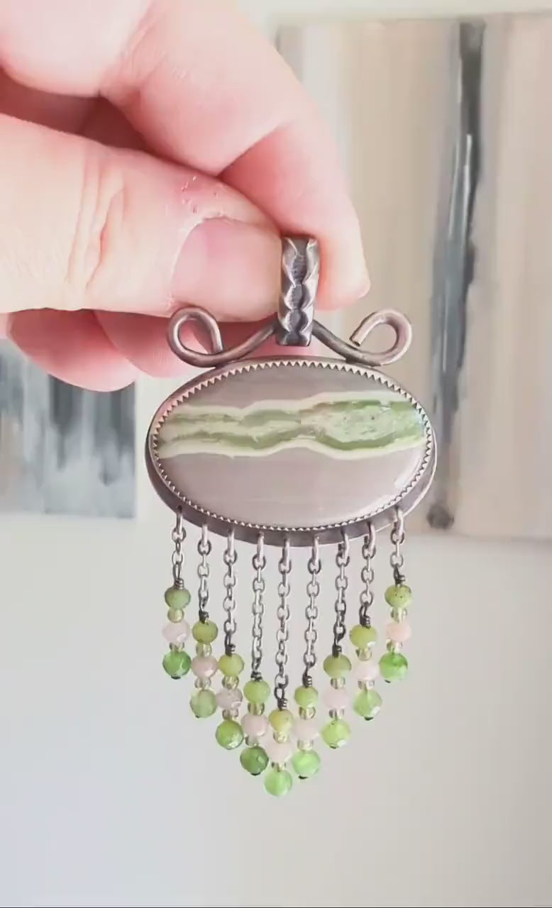 Video of Collector gemstone necklace capturing moody spring palette