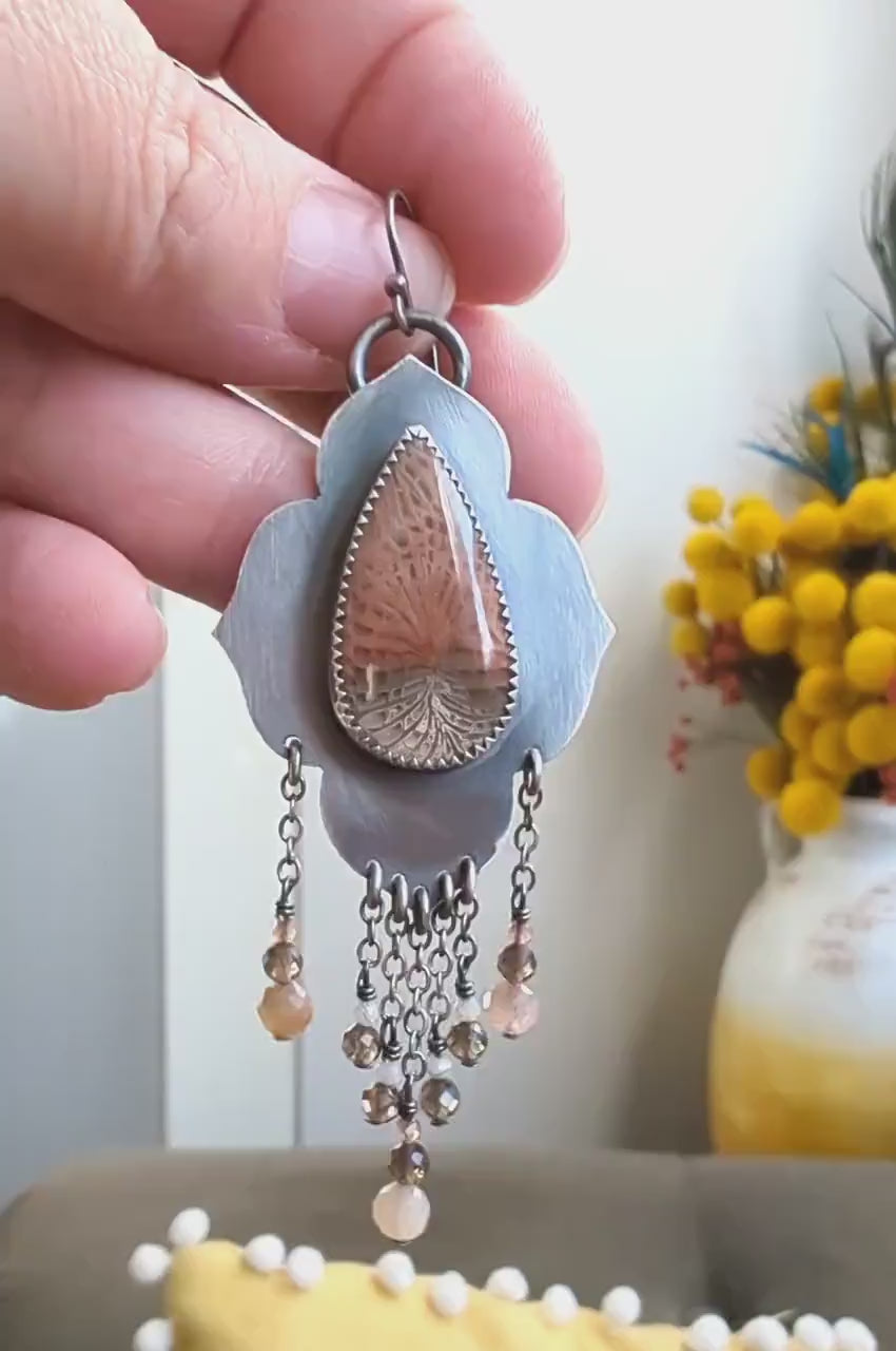 Video of artisan fossil coral earrings by Rebellenhaus