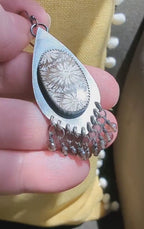 Video of fossil coral smoky quartz earrings by Rebellenhaus