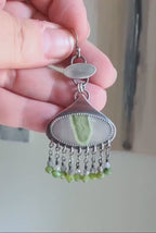 Video of Collector gemstone earrings featuring serpentine and jade