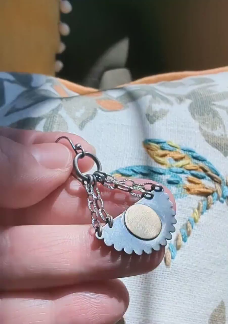 Video of artisan mixed metal earrings by Rebellenhaus
