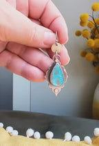 Video of silver and brass boho earrings featuring turquoise jasper and grey jasper stones