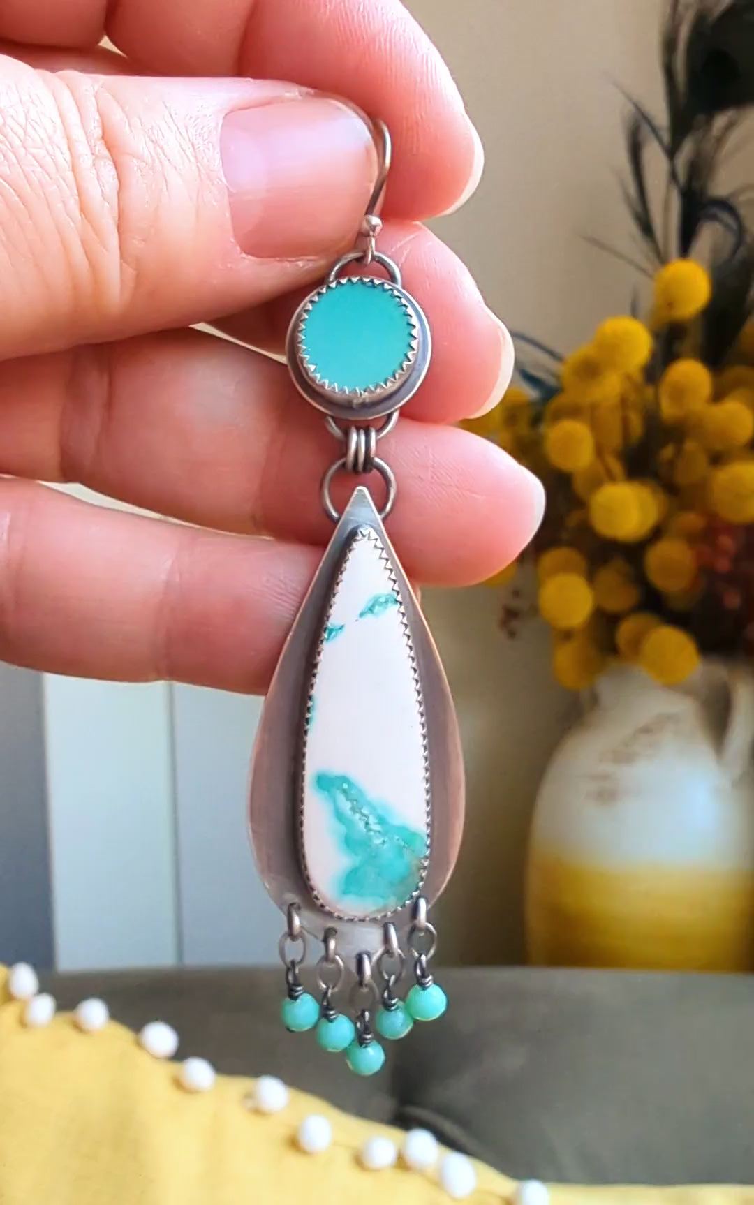 video of two stone turquoise and sea sediment white and blue jasper by Rebellenhaus