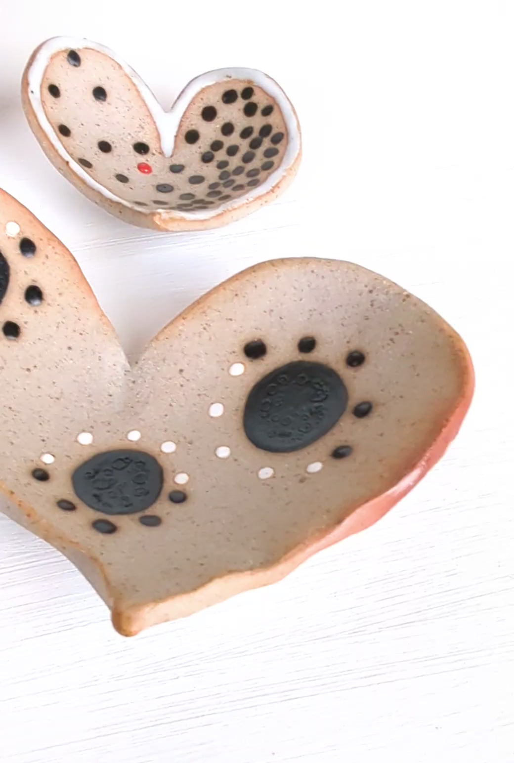 Video of 4 nesting stoneware jewelry dishes. Organic heart shaped and each is one of a kind by Rebellenhaus