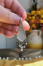 Video of Modern artisan fringe earrings in black and silver