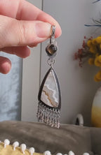 Video of collector jewelry piece with smoky quartz and white agate contrast