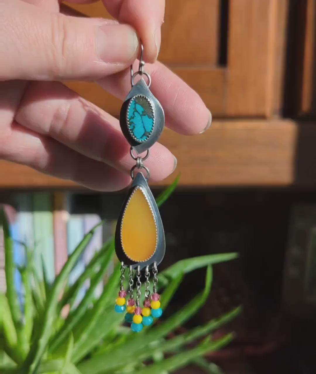 Video of one of a kind turquoise and calcite earrings by Rebellenhaus