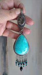 Video of statement gemstone necklace with turquoise and mixed bead fringe by Rebellenhaus