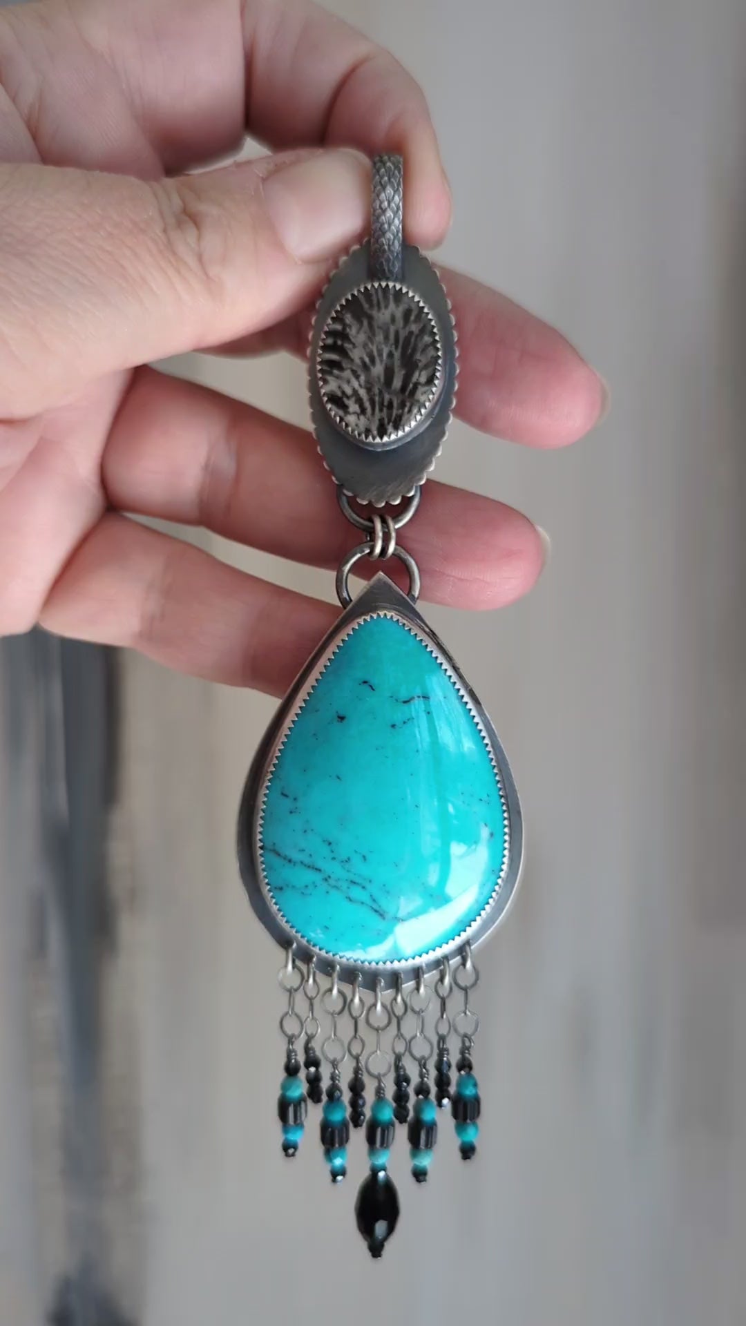 Video of statement gemstone necklace with turquoise and mixed bead fringe by Rebellenhaus