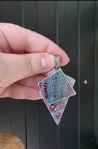 Video of rainbow fluorite and garnet multi-stone pendant from Rebellenhaus