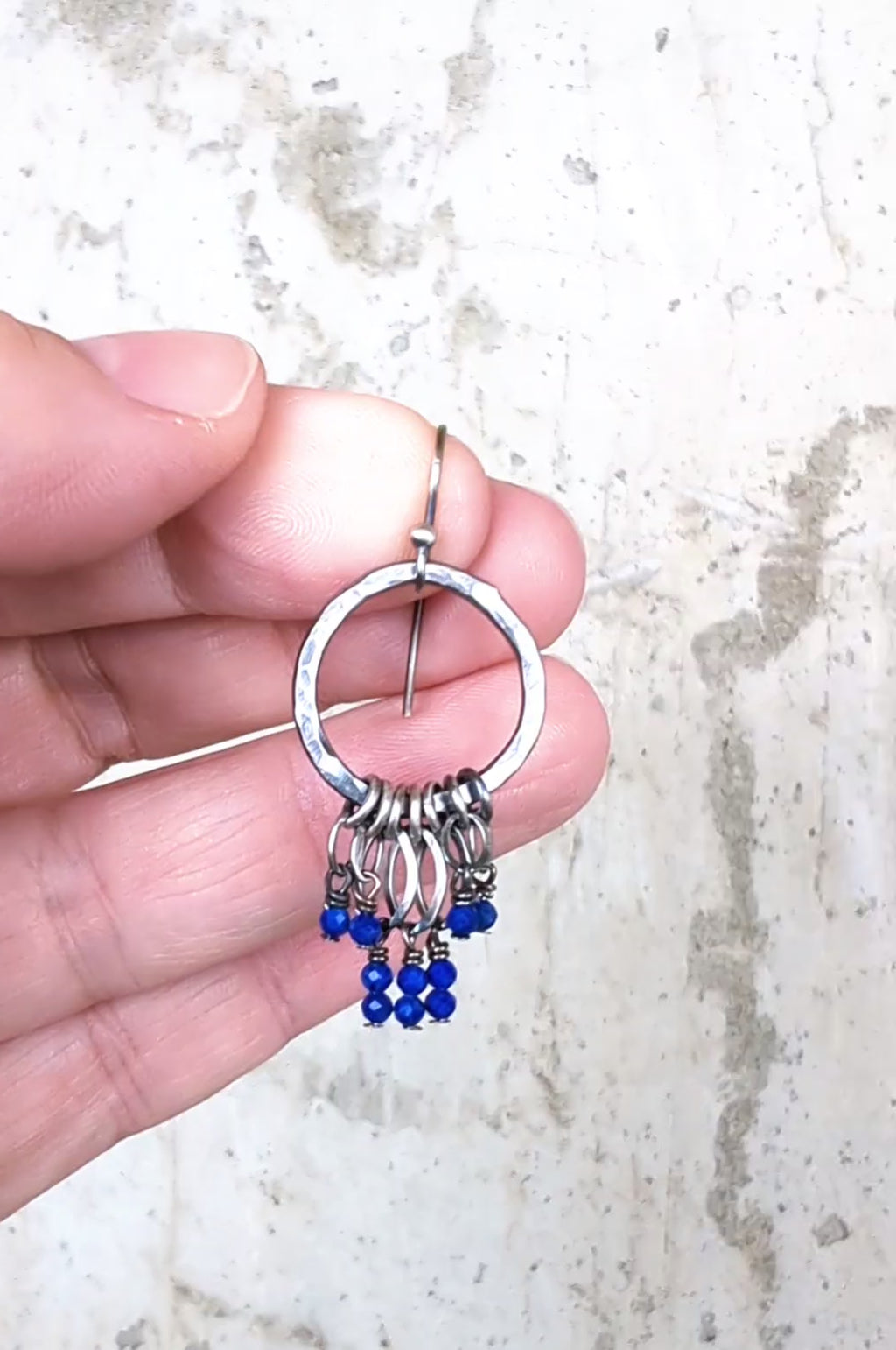 video of handcrafted oxidized sterling silver leaf drop hoop earrings