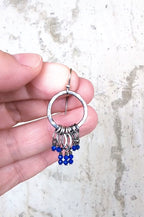 video of handcrafted oxidized sterling silver leaf drop hoop earrings