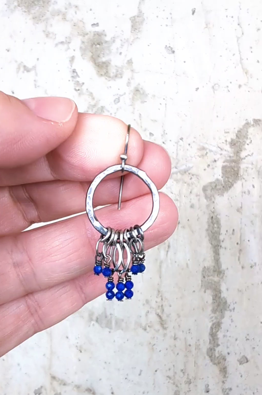 video of handcrafted oxidized sterling silver leaf drop hoop earrings