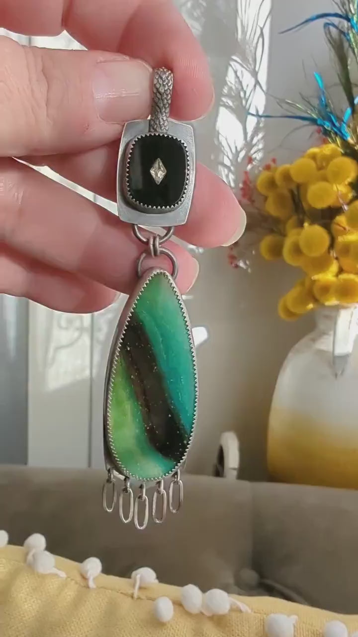 Video of opalized wood and glass pendant by Rebellenhaus