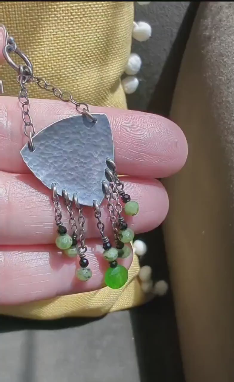 Video of one of a kind green jade chandelier earrings by Rebellenhaus