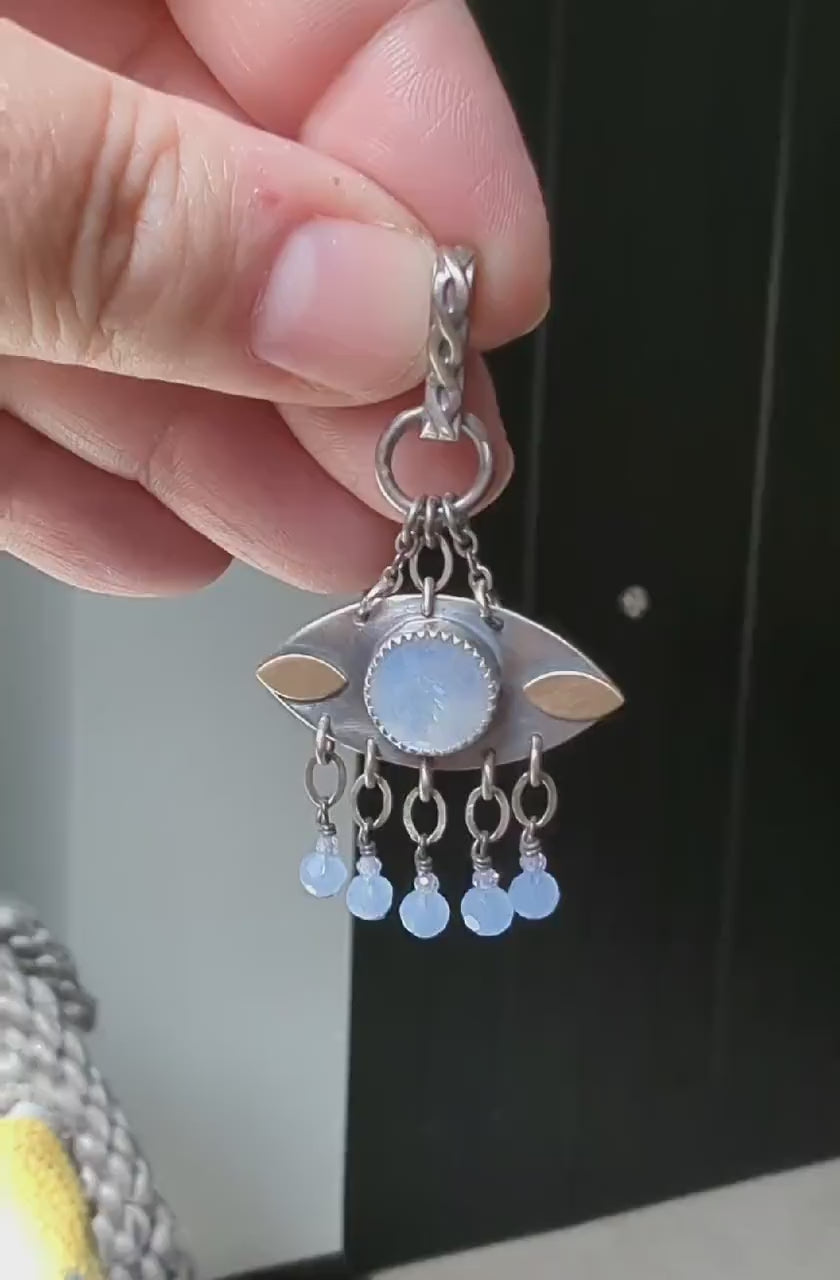 Video of mixed metal moonstone pendant by Rebellenhaus
