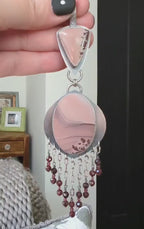 Video of collector jasper pendant with layered canyon-like stone pattern