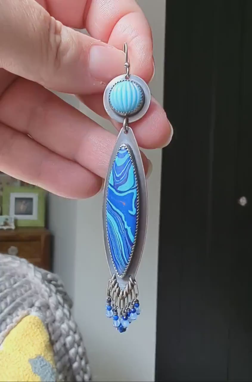 Video of blue super cool earrings by Rebellenhaus