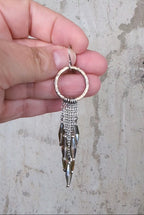 video of handcrafted mixed metal earrings with rainbow flash crystal by beads Rebellenhaus