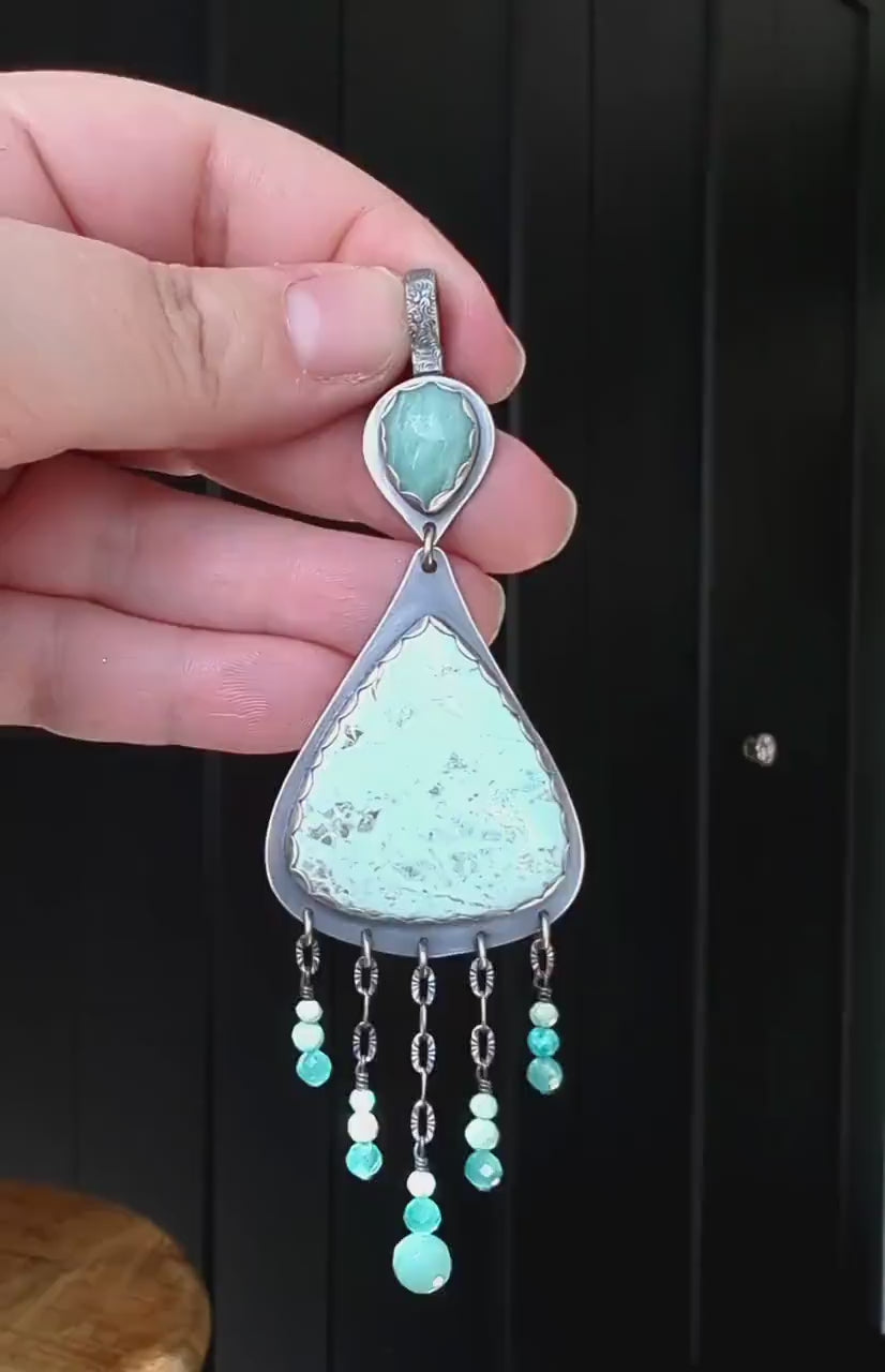 Video of chrysocolla pendant with amazonite details by Rebellenhaus