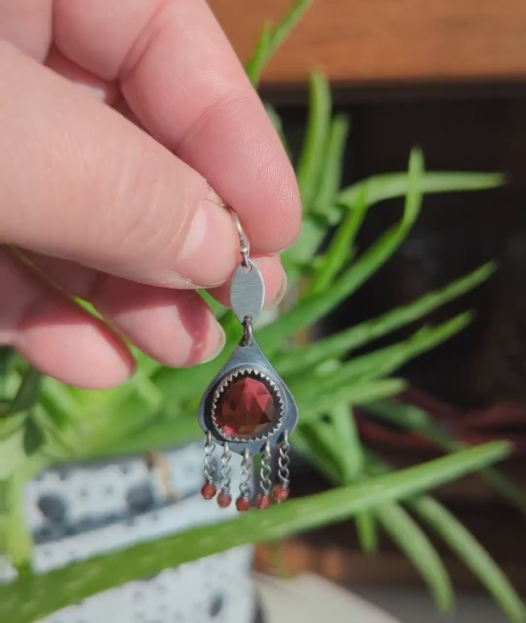 Video of one of a kind garnet birthstone earrings by Rebellenhaus