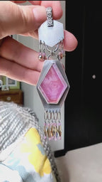 Video of collector ruby pendant in sterling silver with modern design